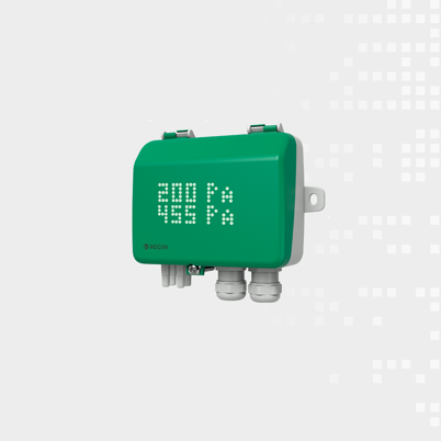 Green REGIN control box with dot-matrix display showing numbers, mounted on a light gray background.