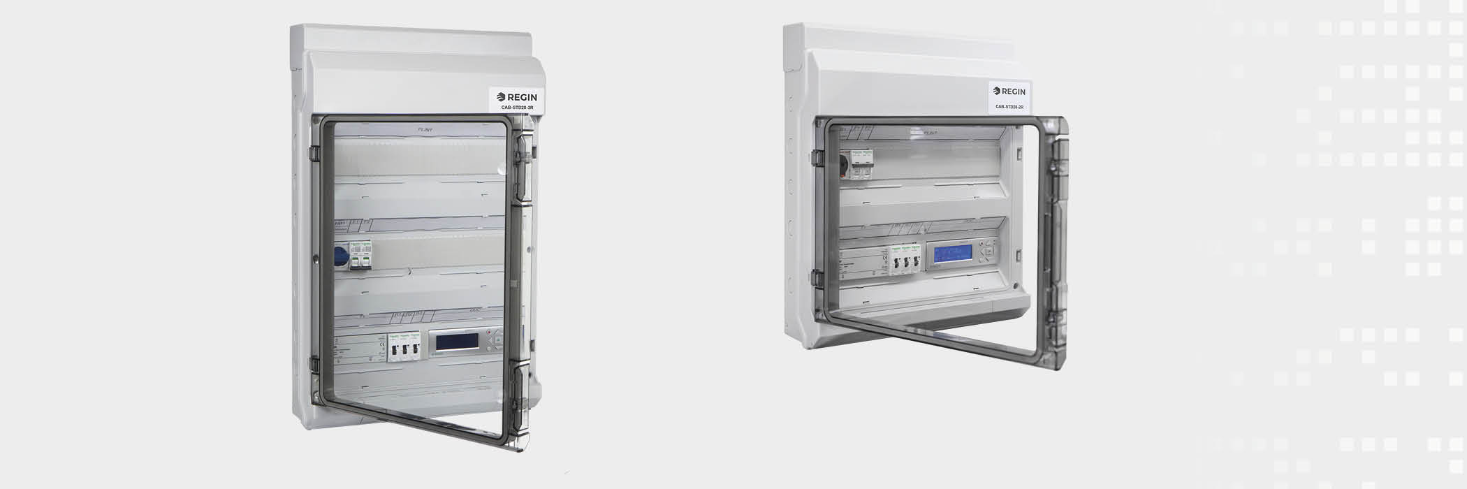 Two white electrical enclosures with transparent doors, housing circuit breakers and control panels.